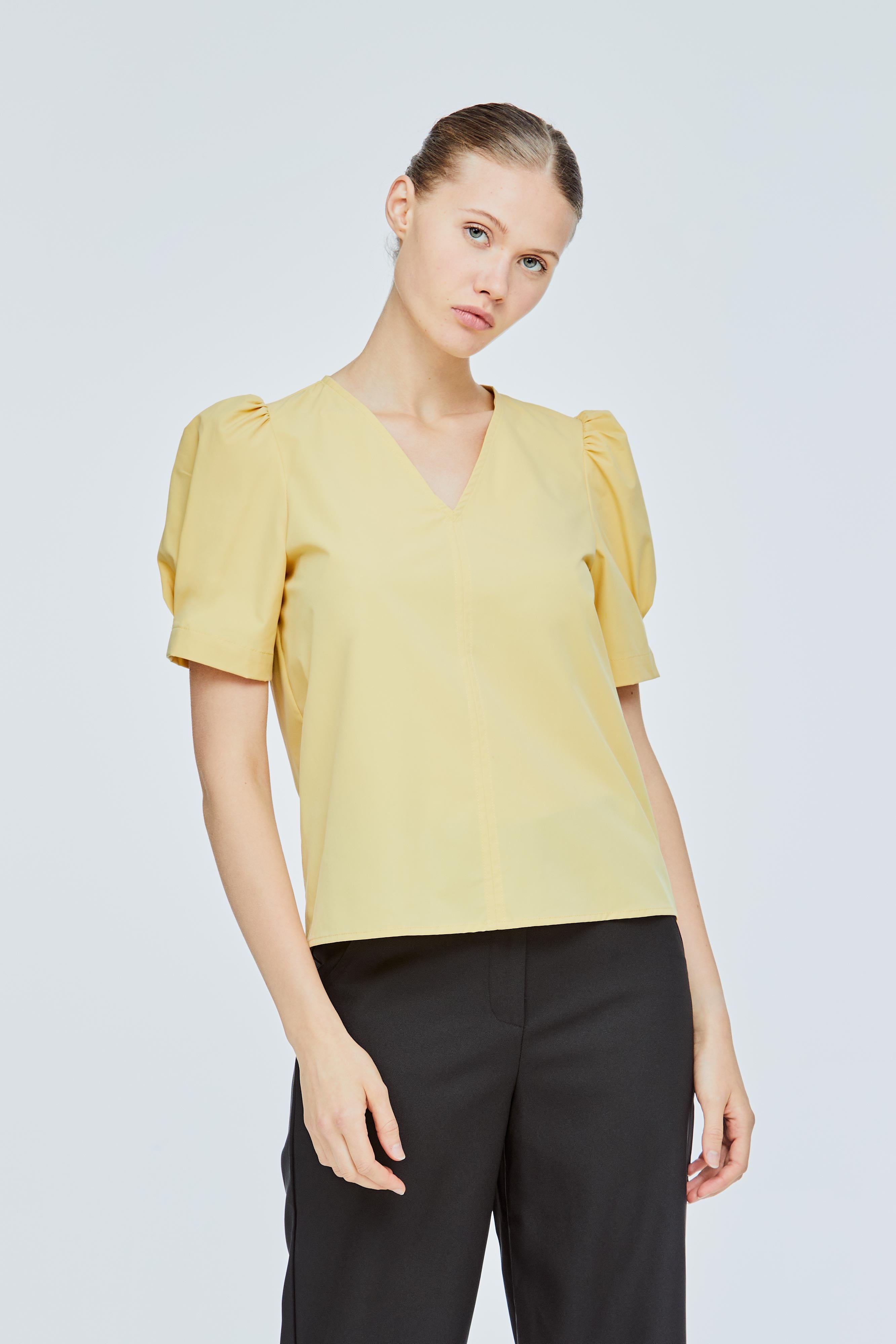 Yellow puff outlet sleeve shirt