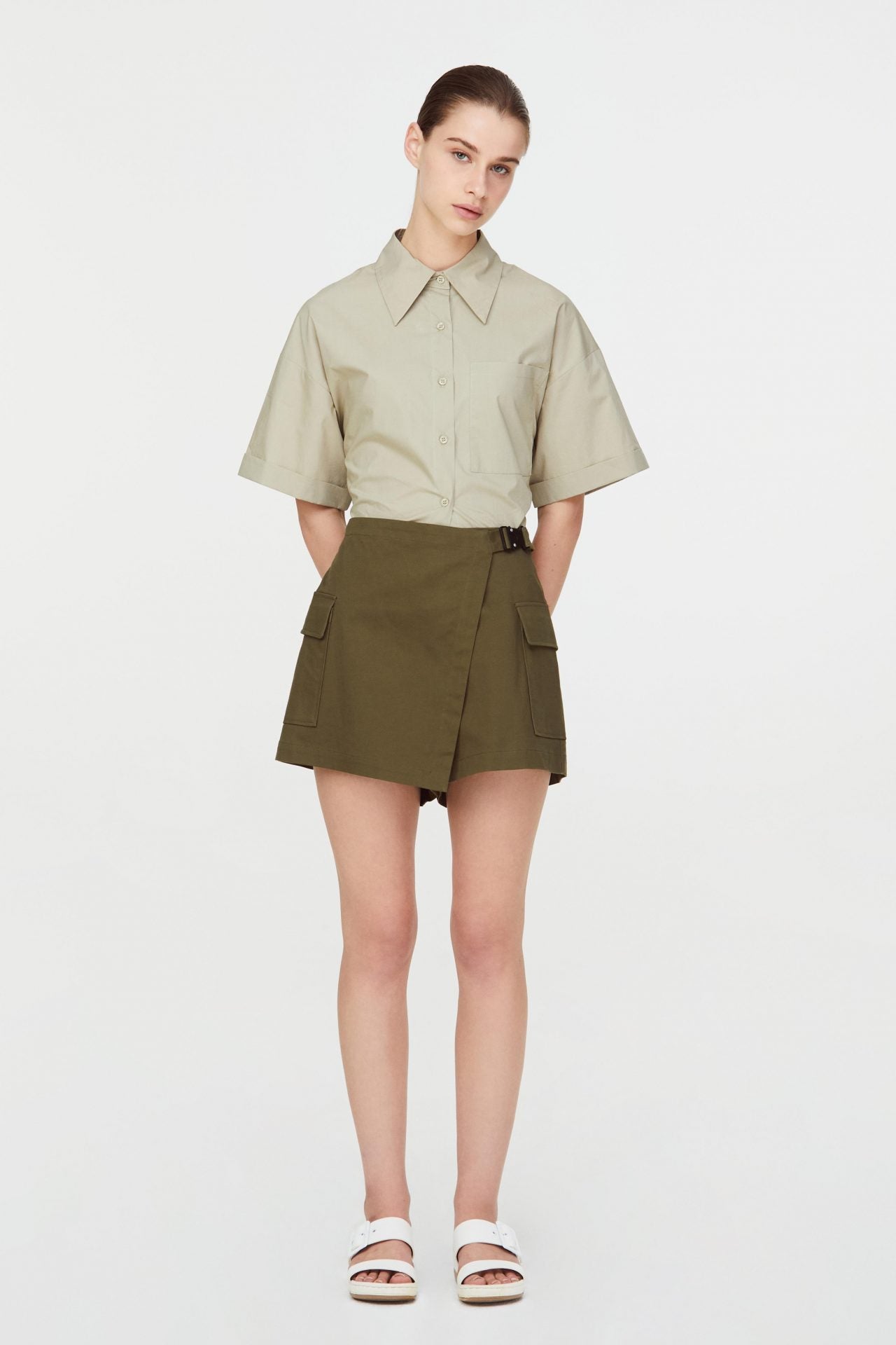 10779 ARMY GREEN OVERLAPPED PANEL BUCKLE SHORTS 1